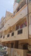 A vendre immeuble R+3 avec 7 appartements et une valeur locative de 800.000fcfa